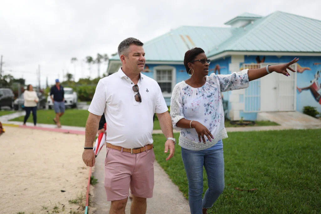 Marc Weller tours Grand Bahama Children's Home with executive director June Hutcheson